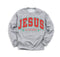 grey sweatshirt that says jesus is the reason for the season in red tex