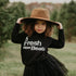 little girl posing in graphic sweatshirt that says a fresh new beat