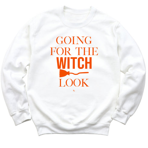 white sweatshirt with orange ink perfect for halloween. text says going for the witch look.
