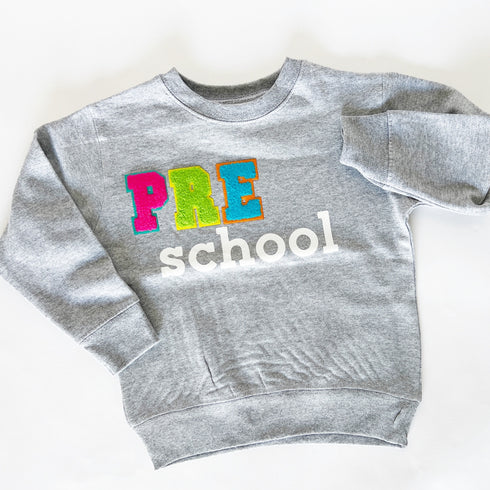 Preschool Pullover, First Day of School, Patch Sweatshirt, Childhood fashion, Back to School, Kids' clothing, Adorable designs, Vibrant colors, Whimsical motifs, Comfortable and durable, Personalized artwork, Animal appliqués, Alphabet patches, Educational symbols, DIY inspiration, Coordinating outfits, Picture-perfect moments, Creative ideas, Teacher resources, Classroom inspiration, Commemorate milestones, Endless possibilities, Lasting memories.