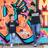 mom and daughter wearing matching shirts in front of graffiti wall for a cute mommy and me set