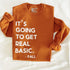 pumpkin orange sweatshirts with screen print text that says its going to get real basic fall, this is a fall sweatshirt, flat lay