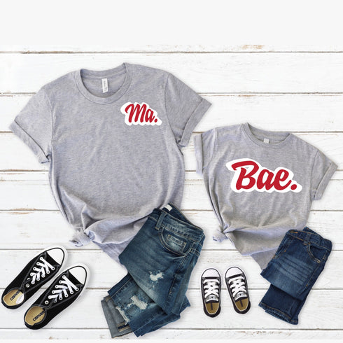 unisex grey shirts matching adult and toddler shirts one says ma with a pocket style design and the kids shirt says bae